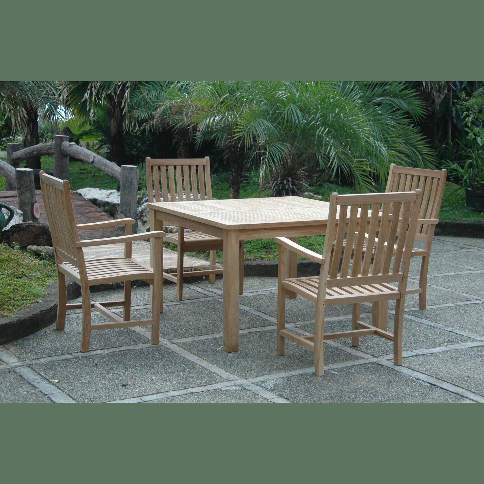 Windsor 5-piece teak dining set with Wilshire armchairs on a patio