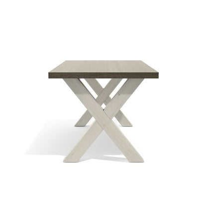 Square table with a concrete top and X-shaped metal legs on a white background