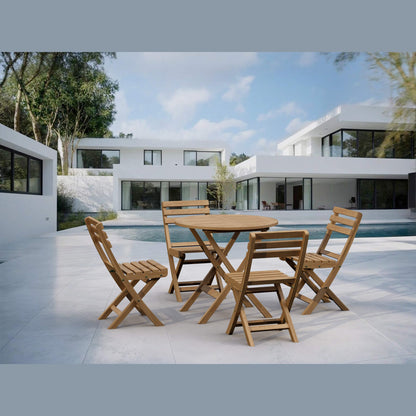 Wooden outdoor table and chairs in front of a modern house with a pool.