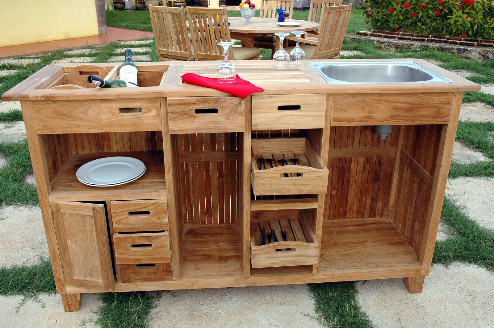 Wooden bar cart with storage compartments and wine glass holders.