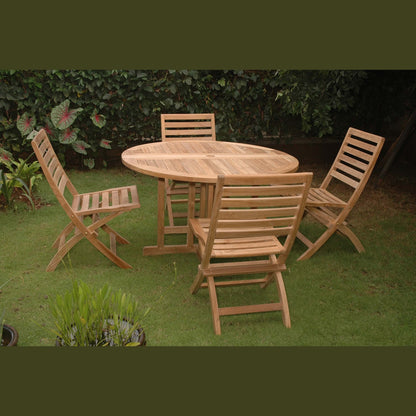 Wooden outdoor table with four matching chairs on a grassy area.