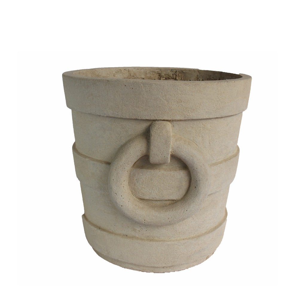 Decorative stone pot with a circular handle on a white background