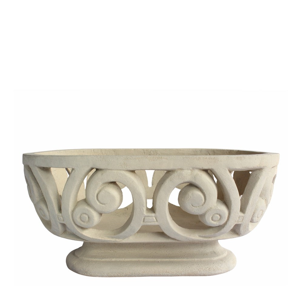 Decorative stone bowl with intricate carvings on a white background