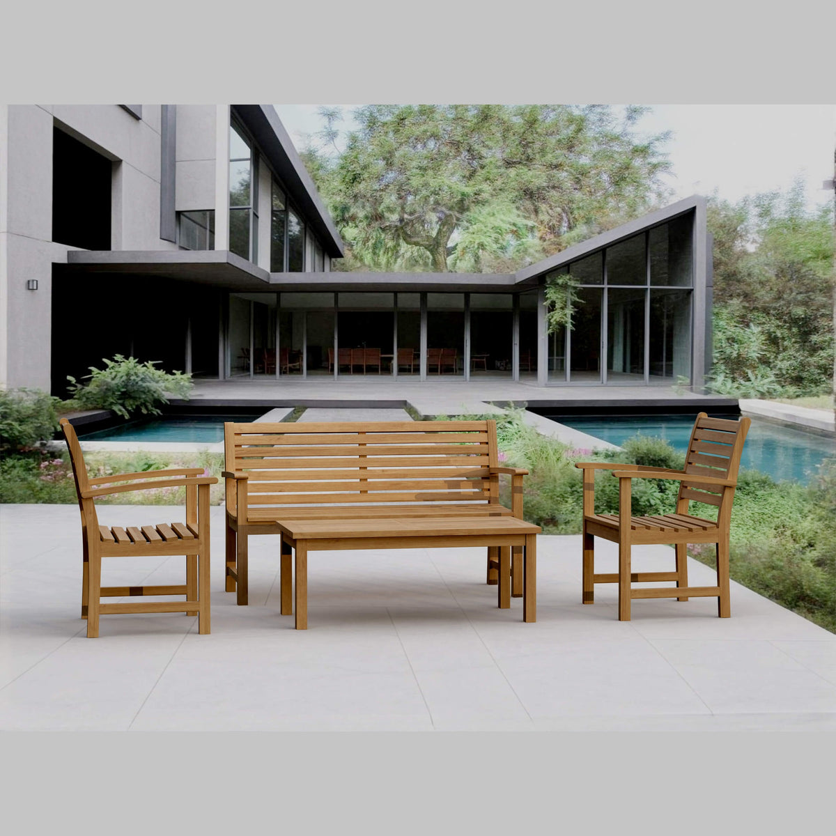 Wooden outdoor furniture set with a modern house and pool in the background