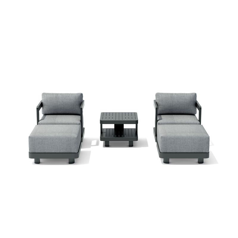 Modern outdoor furniture set with two gray sectional chairs and a small table on a white background