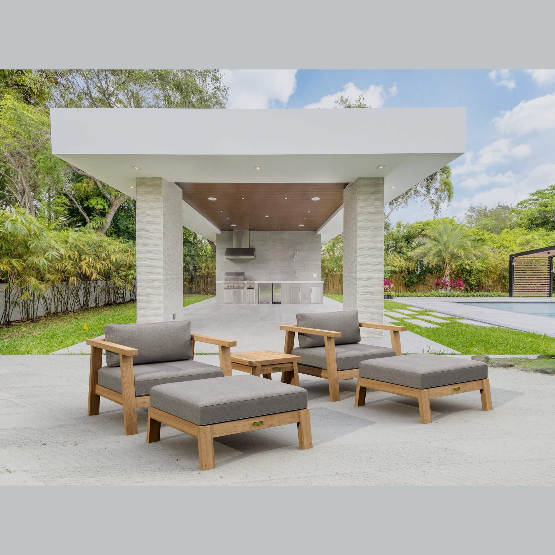 Outdoor patio with wooden furniture and a covered area.