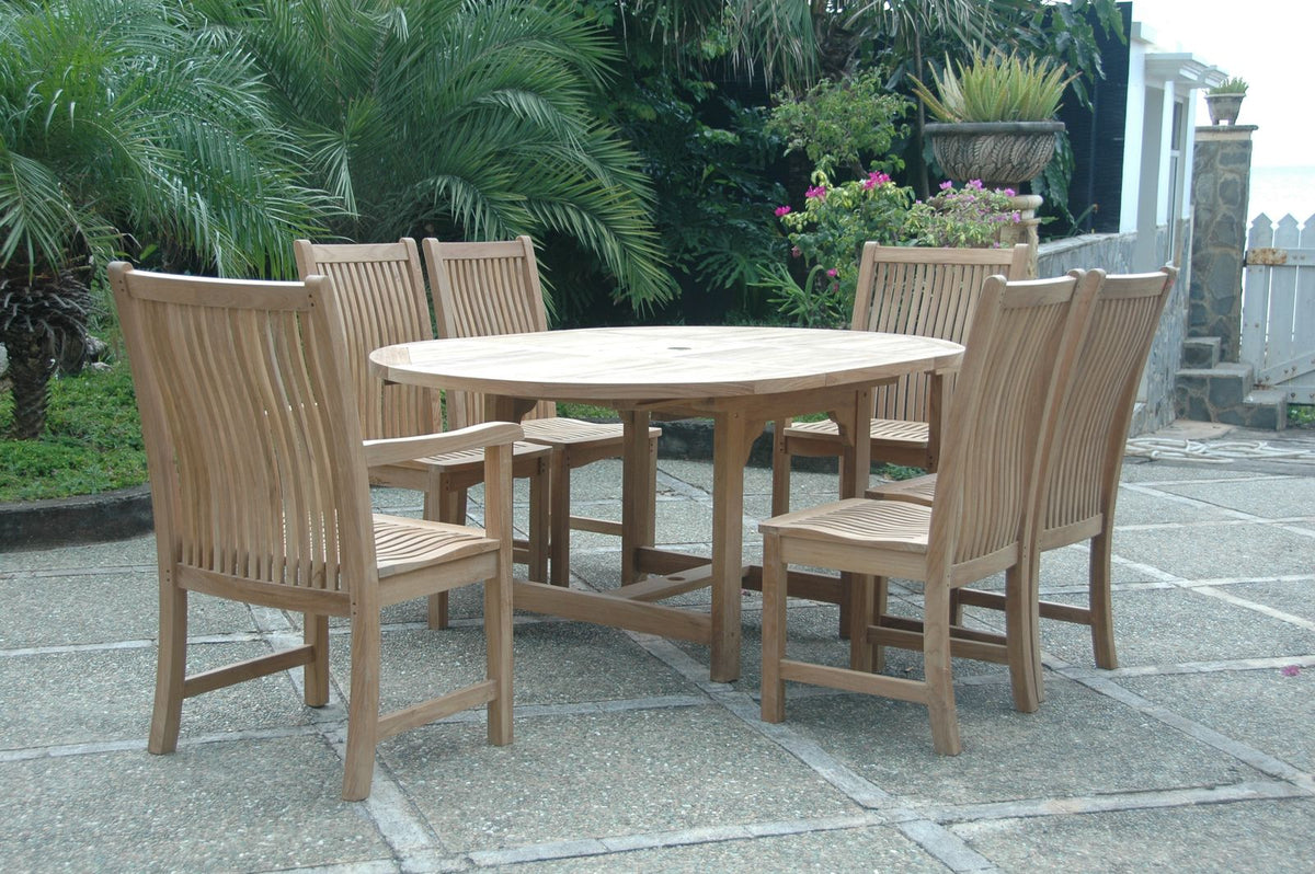 Wooden outdoor dining set with round table and six chairs on a stone patio.