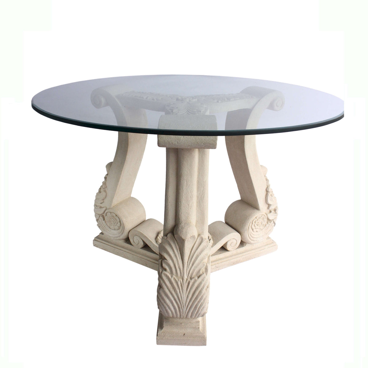 Round glass-top table with decorative white legs on a white background