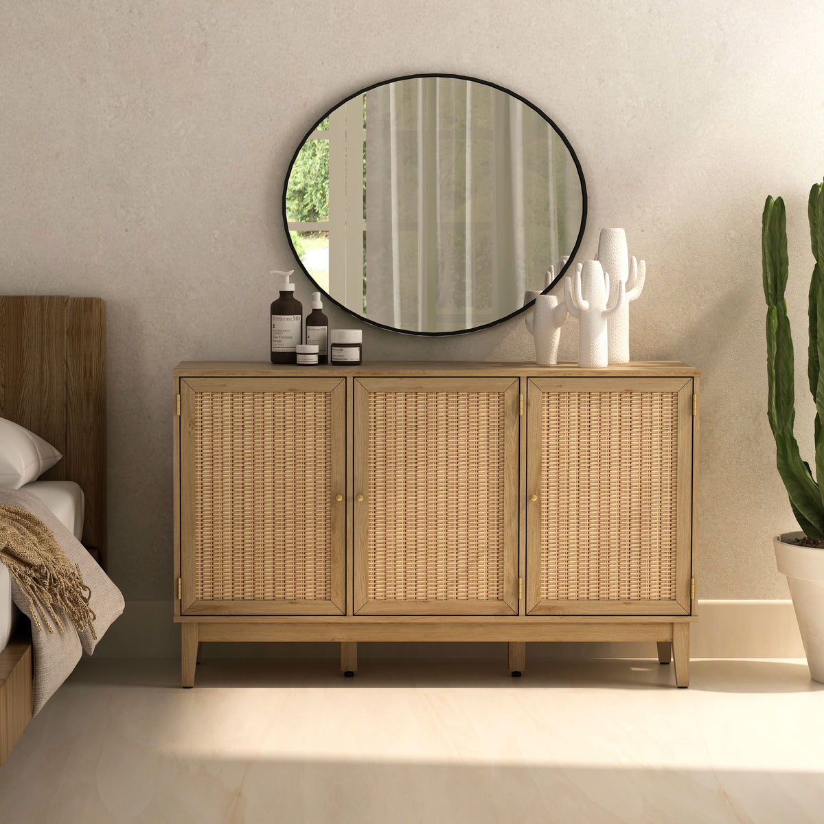 Wooden cabinet with wicker doors in a bedroom setting with a round mirror above it.