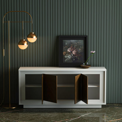 Modern white cabinet with open doors against a dark green striped wall with a floor lamp and framed picture.