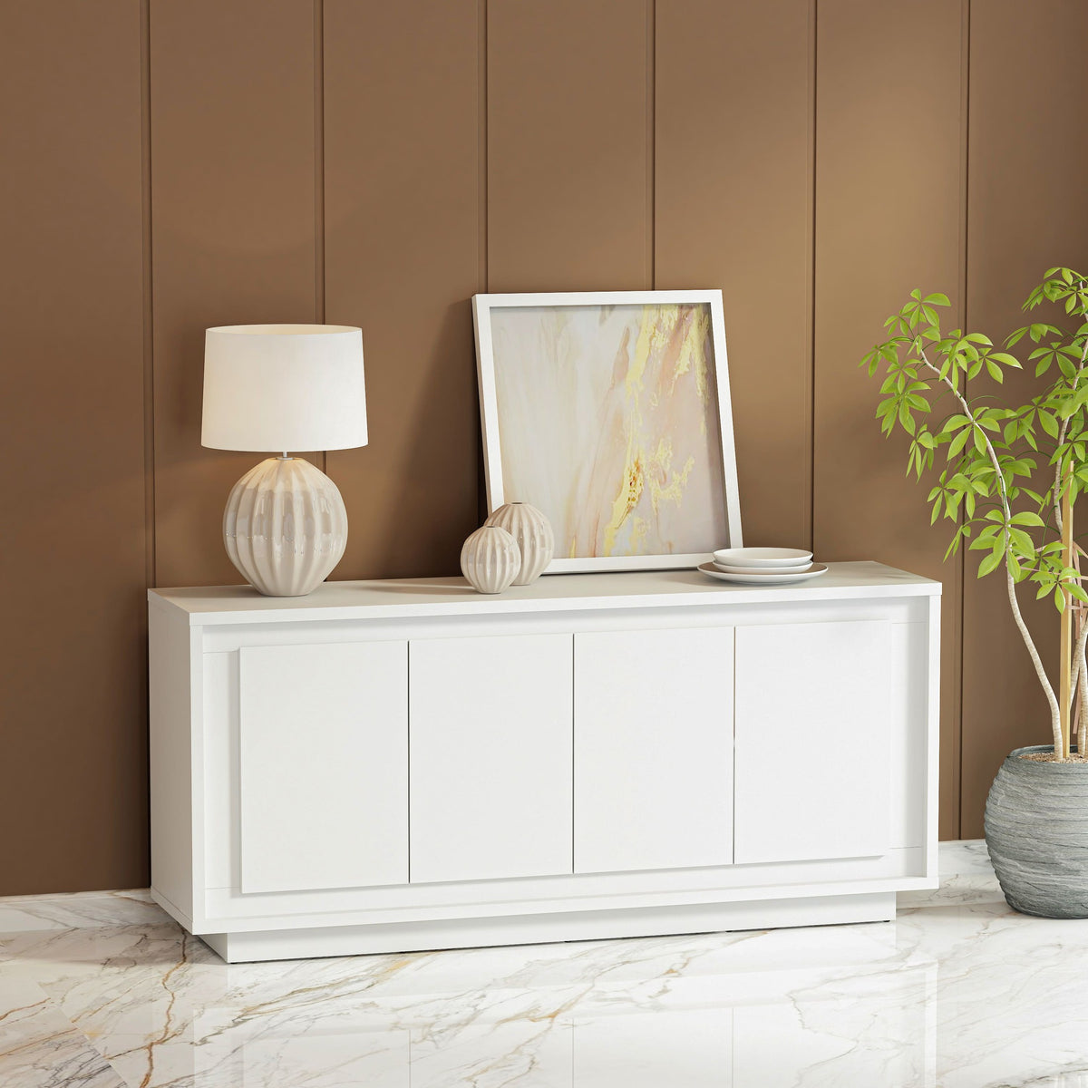 White sideboard with decorative items against a brown paneled wall.