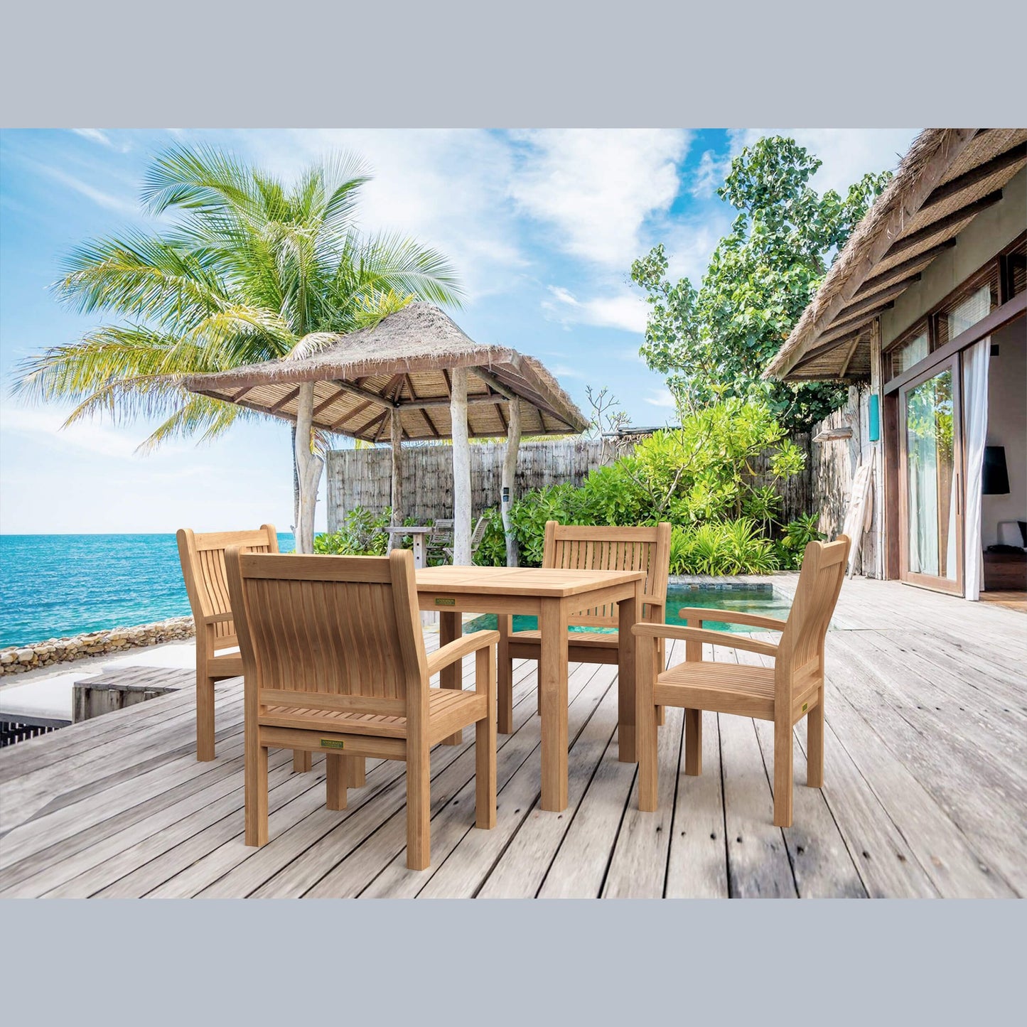 Wooden outdoor furniture set on a deck with ocean view