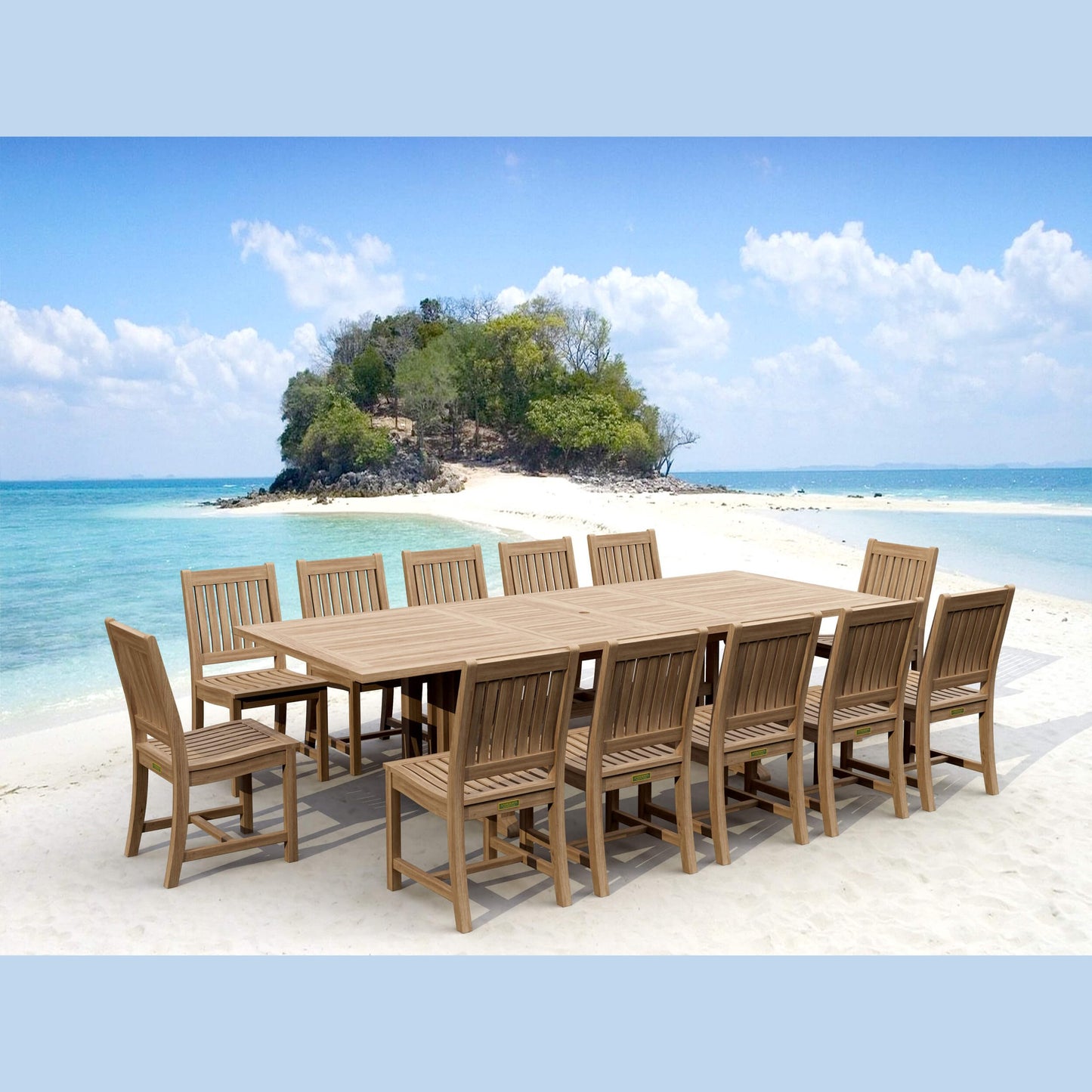 Wooden outdoor dining set on a sandy beach with turquoise water and a small island in the background.