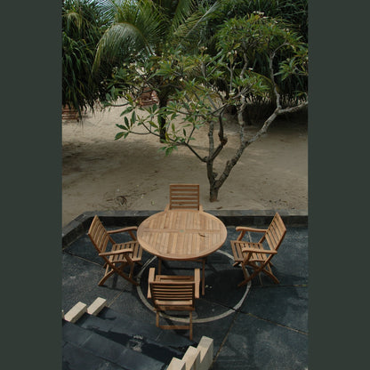 Wooden outdoor furniture set with a round table and chairs on a stone patio.