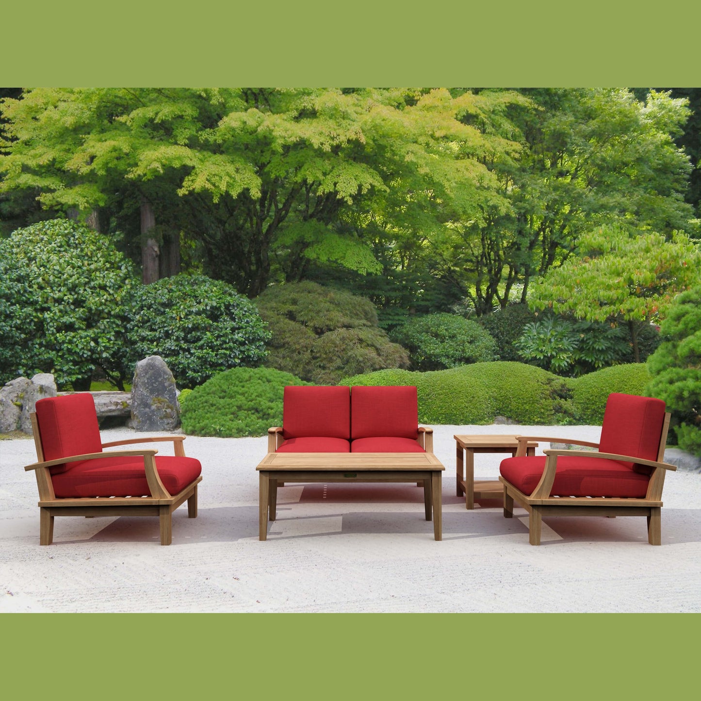 Outdoor furniture set with red cushions in a garden setting