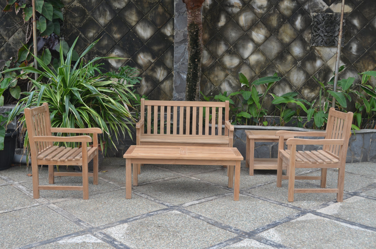 Wooden outdoor furniture set with chairs and a bench on a stone patio.