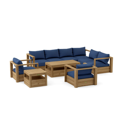 Wooden outdoor furniture set with blue cushions on a white background