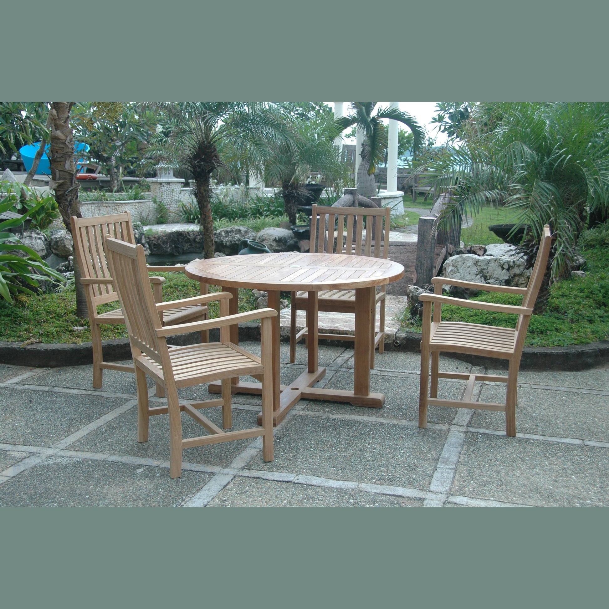 Wooden outdoor dining set with table and chairs in a garden setting