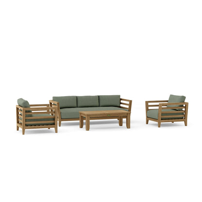 Outdoor furniture set with wooden frames and green cushions on a white background