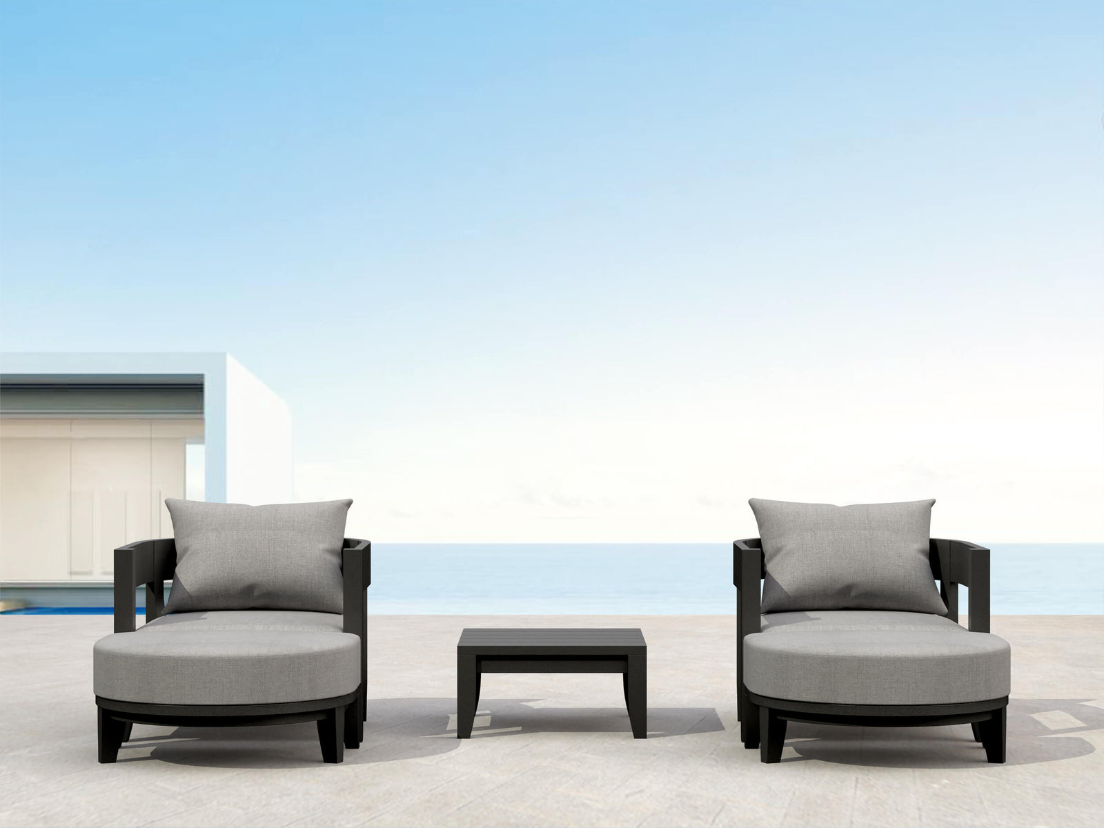 Outdoor furniture set with two chairs and a table on a patio with a clear blue sky.