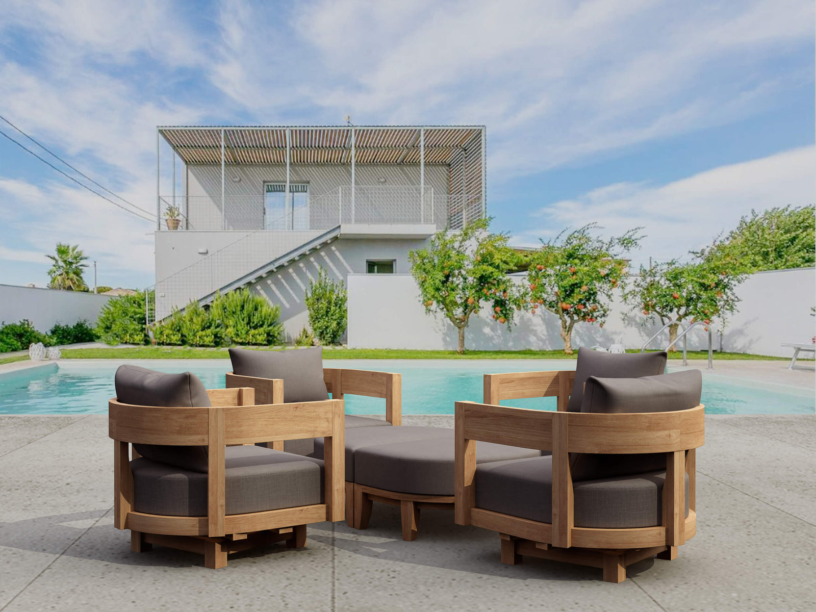 Outdoor furniture set with brown frames and gray cushions by a poolside.