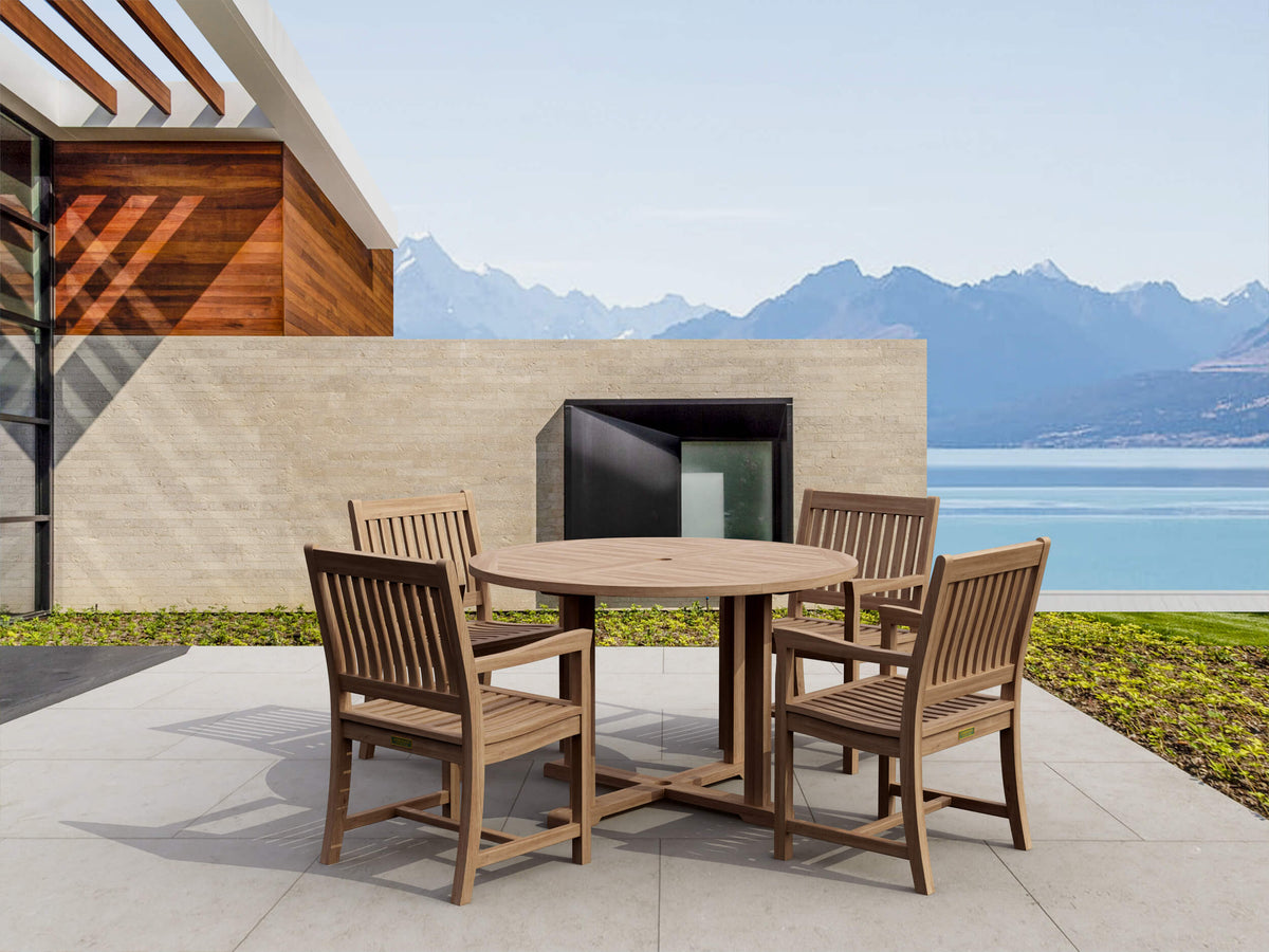 Wooden outdoor dining set with a scenic view of mountains and water.