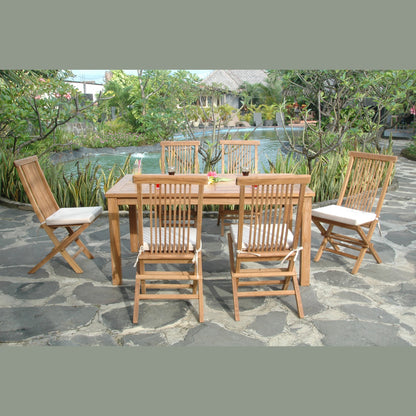 Wooden outdoor dining set with chairs on a stone patio near a pool.