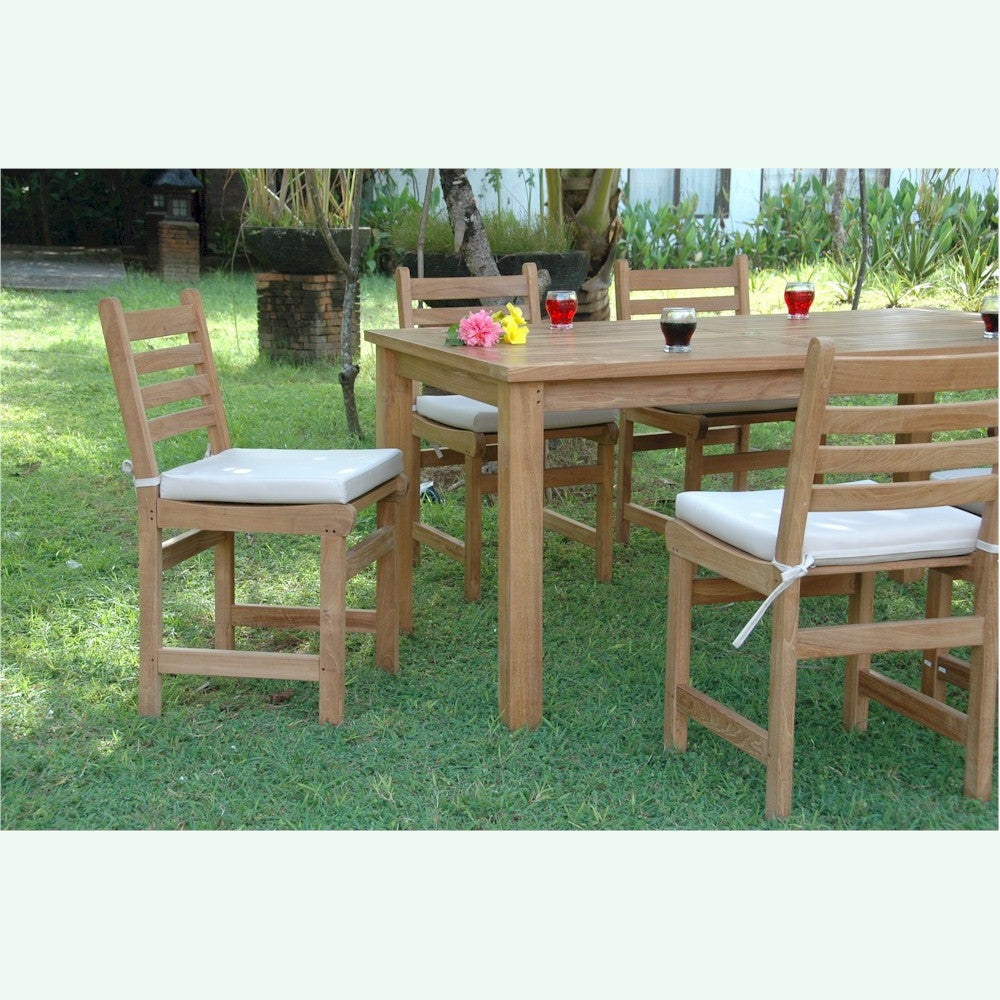 Wooden outdoor dining set with chairs and table on grass
