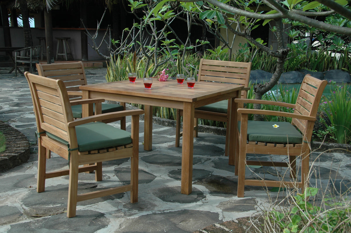 Wooden outdoor dining set with chairs and table on a stone patio