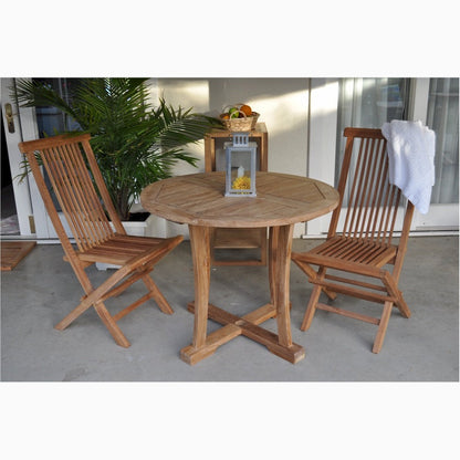 Wooden outdoor table with chairs on a patio