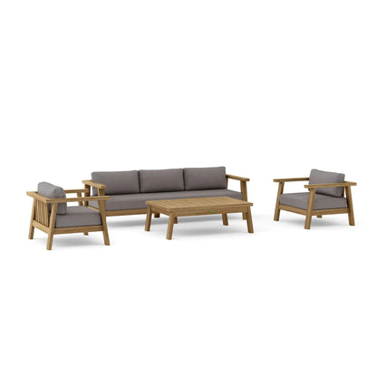 Outdoor furniture set with sofa, chairs, and table on a white background