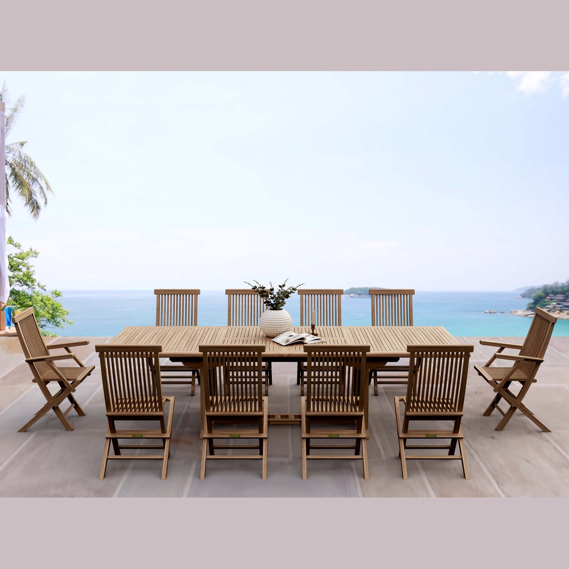 Wooden outdoor dining set with chairs on a deck overlooking the ocean.
