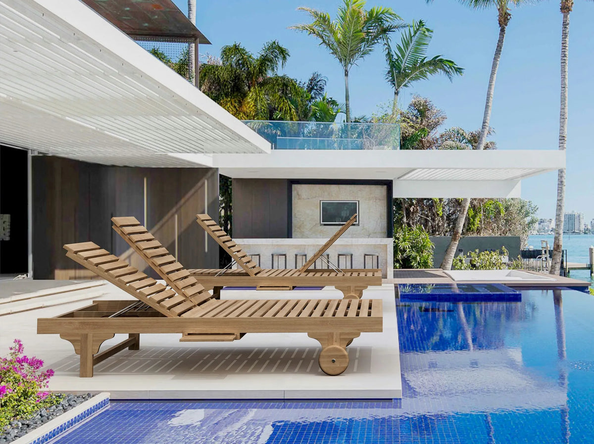 Wooden lounge chairs by a pool with palm trees and a clear sky
