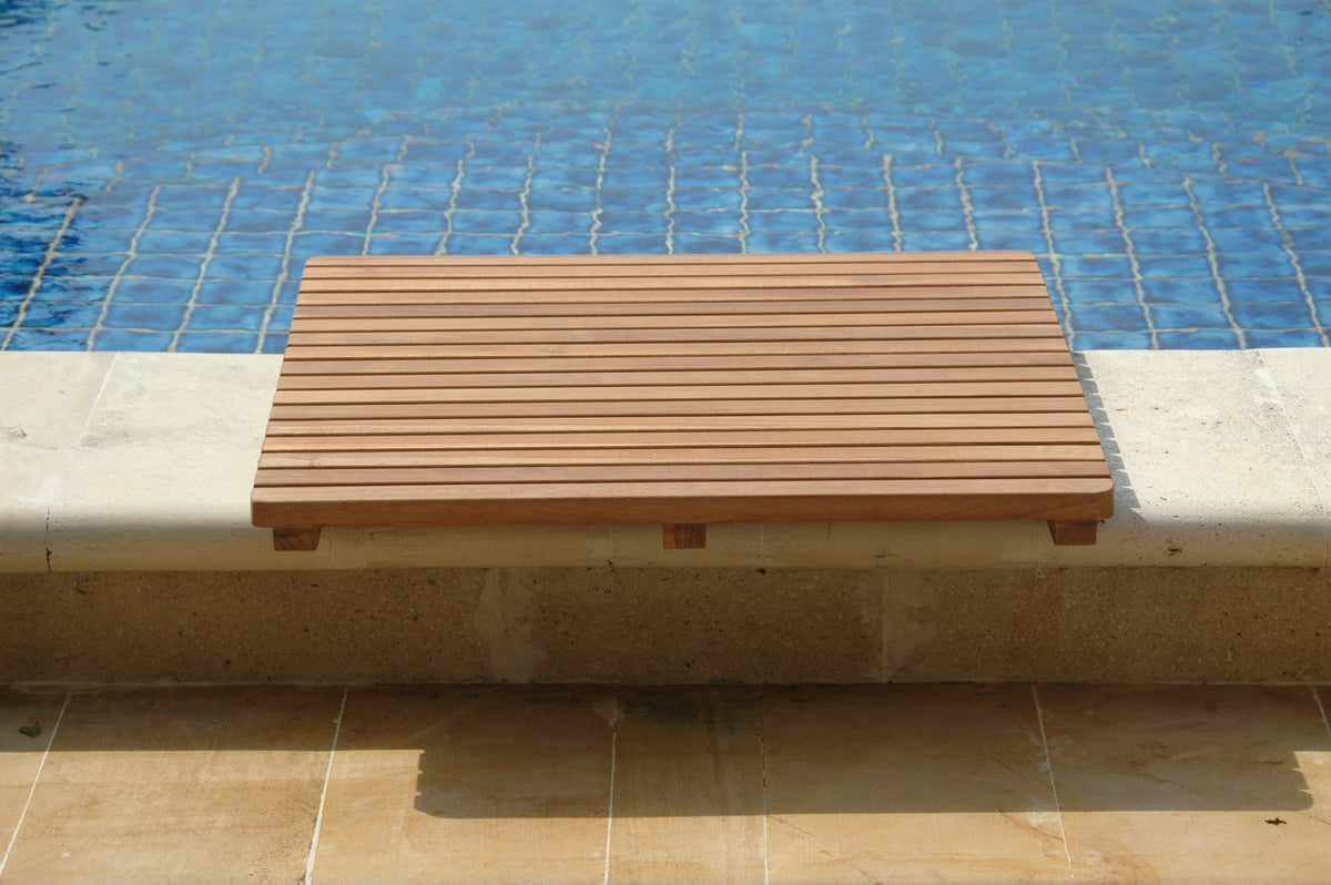 Wooden deck board by a poolside