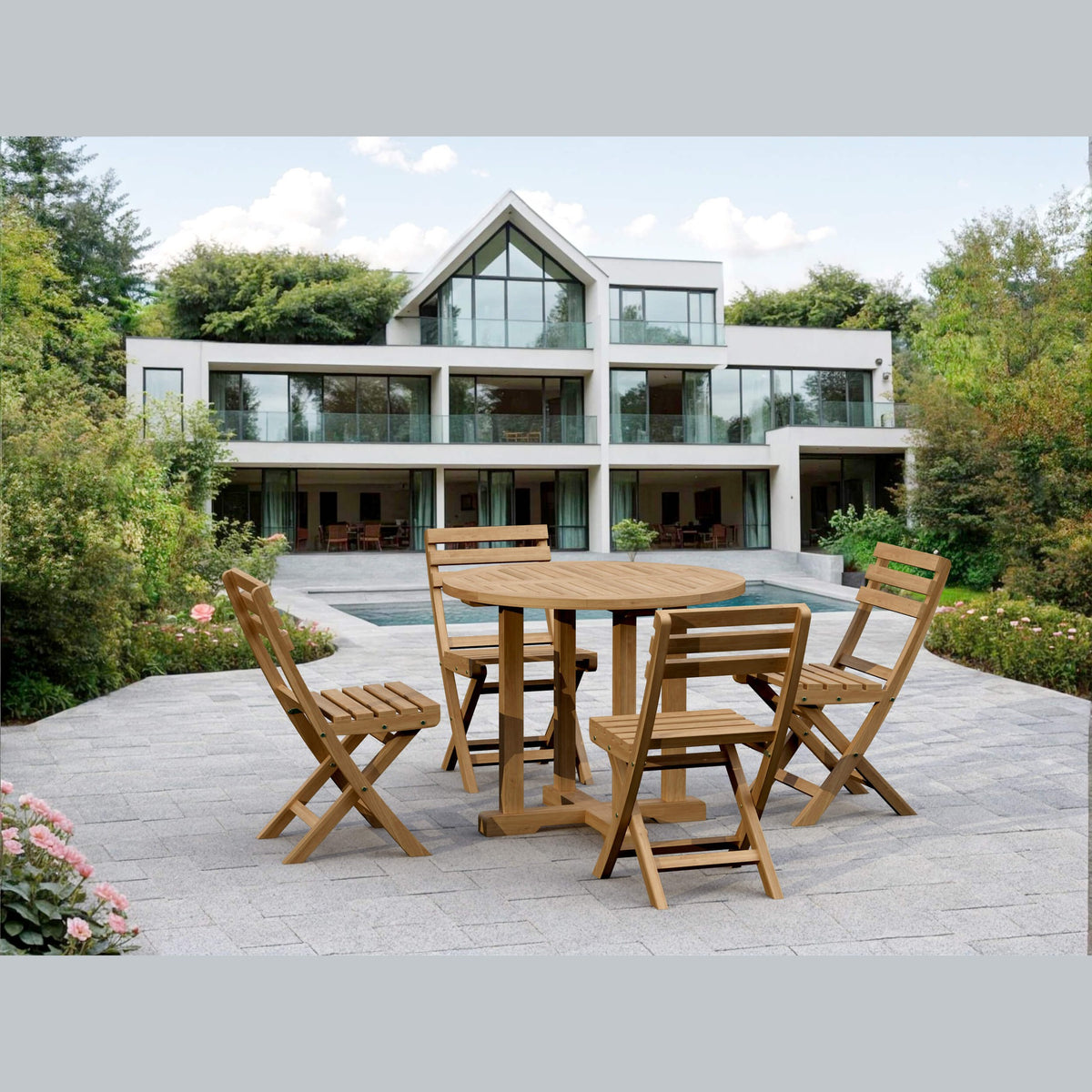 Wooden outdoor dining set on a patio with a modern house in the background