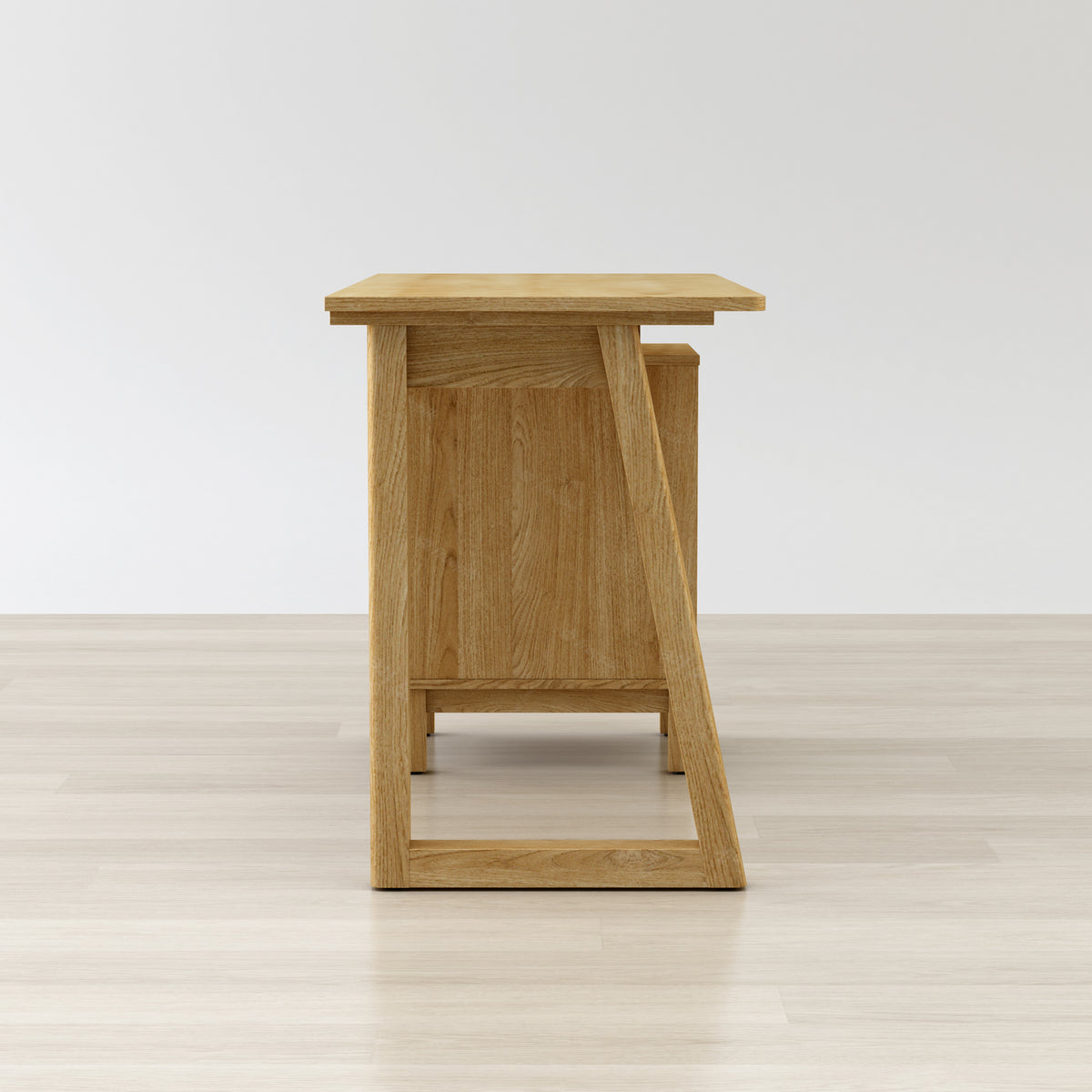 Wooden side table on a light wooden floor with a white background