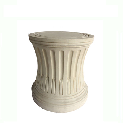 Beige decorative pedestal on a white background