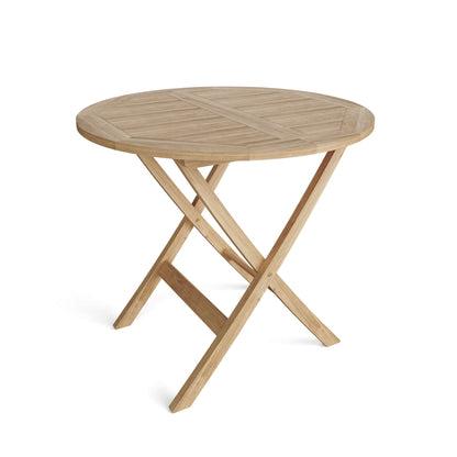 Round wooden folding table on a white background