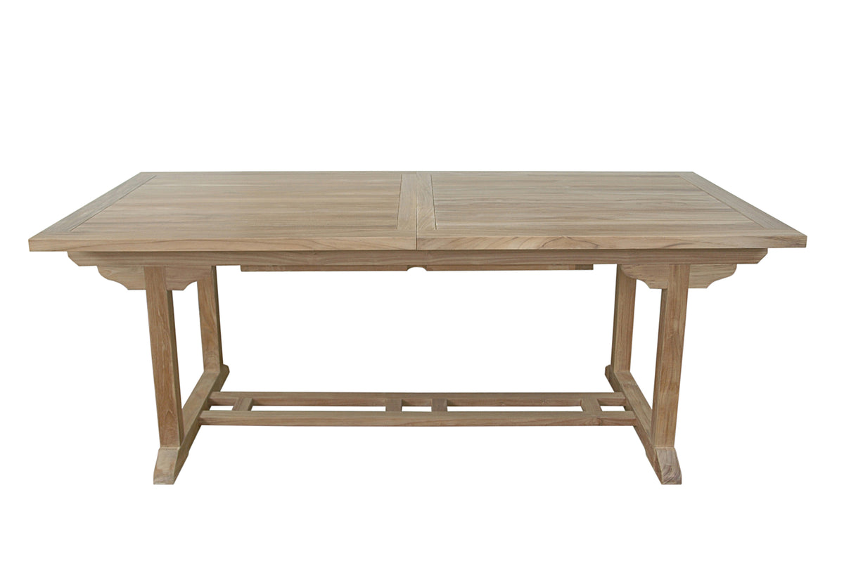 Wooden dining table on a white background