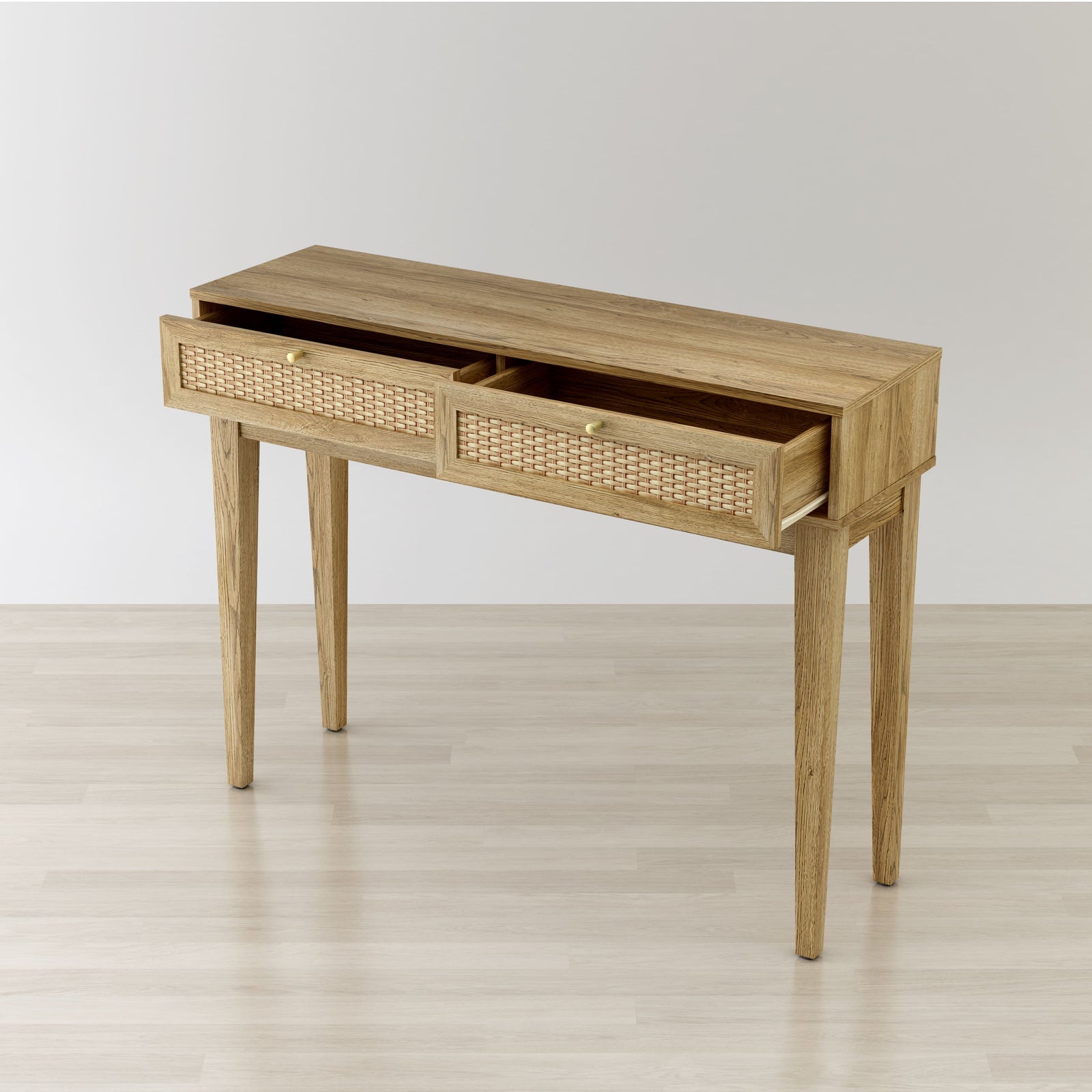 Wooden console table with two drawers on a light wooden floor.
