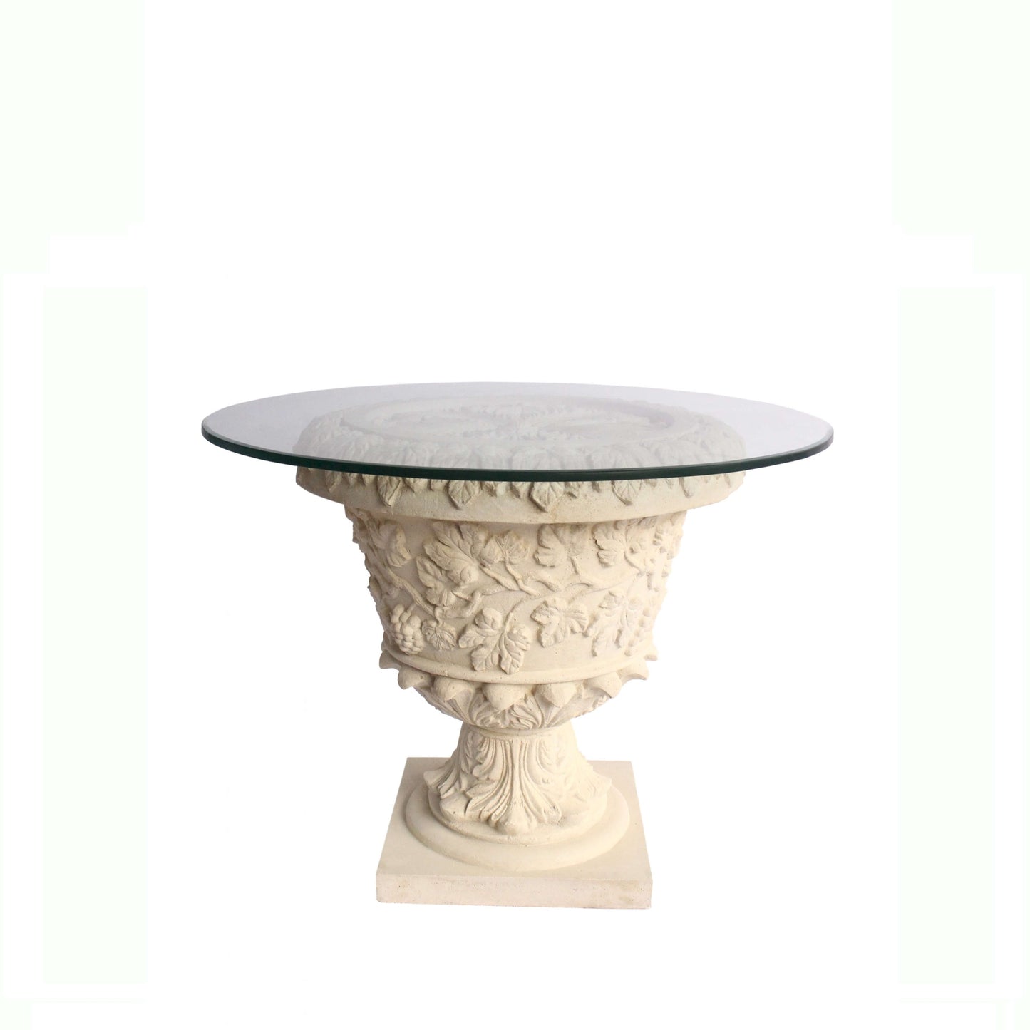 Decorative table with classical design and glass top on a white background