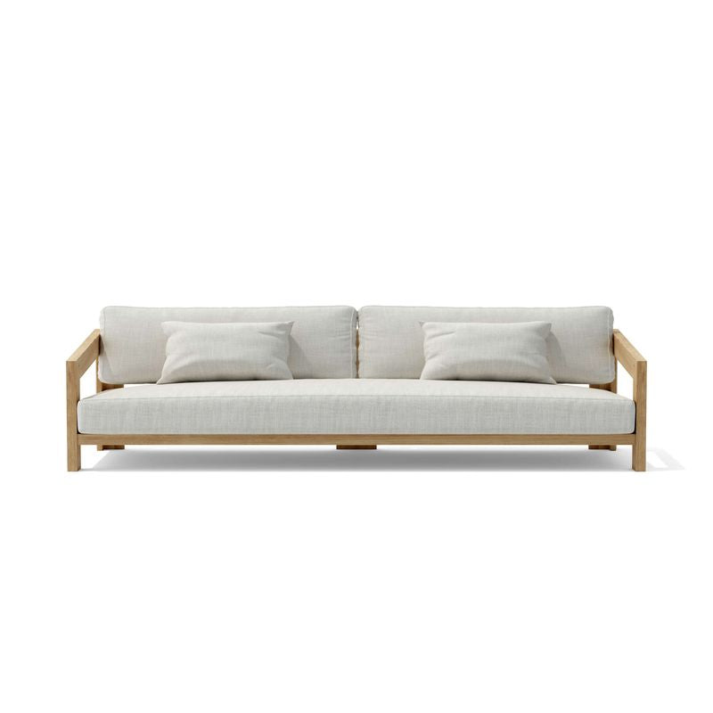 Sofa with light wooden frame and white cushions on a white background