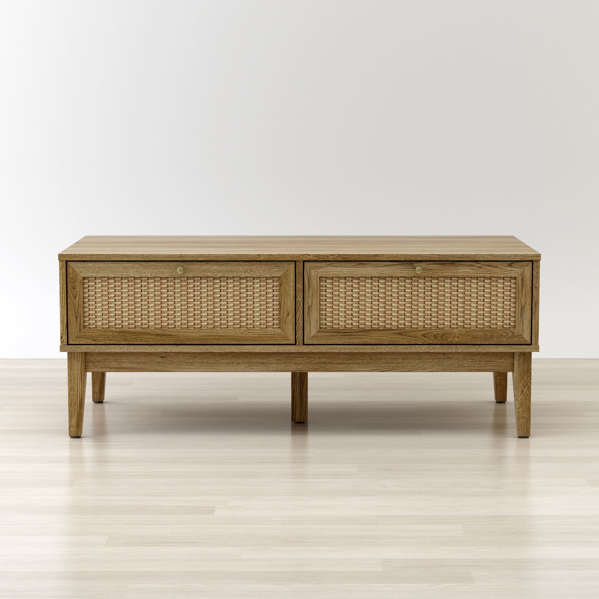 Wooden console table with wicker doors on a light wooden floor and white background