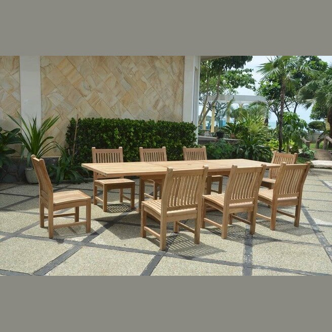Wooden outdoor dining set with chairs on a patio