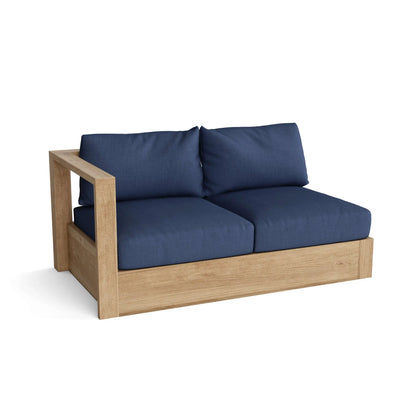 Wooden sofa with blue cushions on a white background
