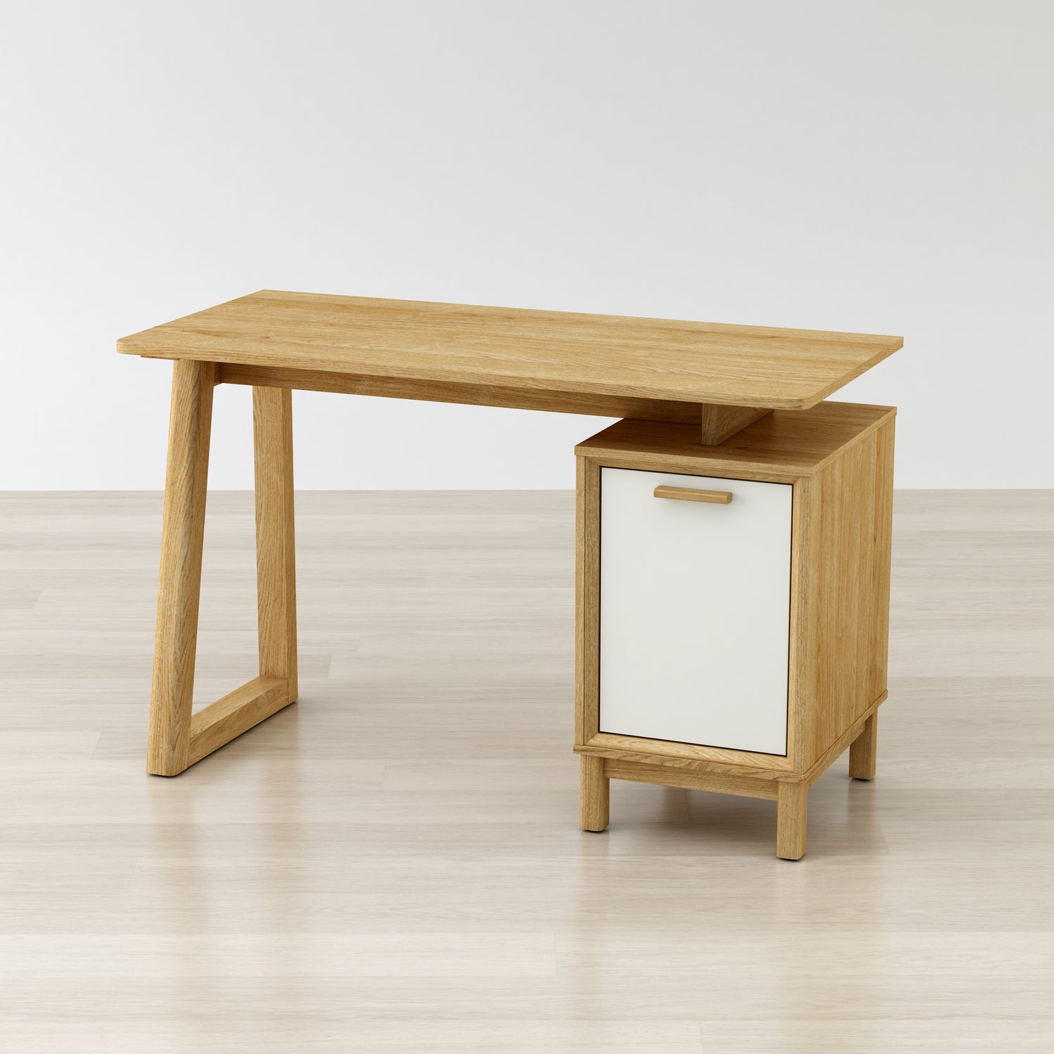 Wooden desk with a smaller matching cabinet on a light wooden floor.