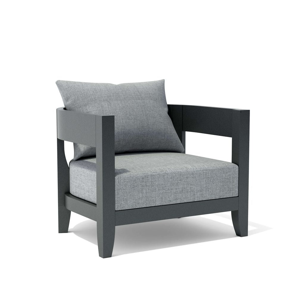 Gray armchair with a cushion on a white background