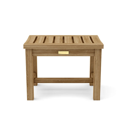 Wooden stool with a gold plaque on a white background
