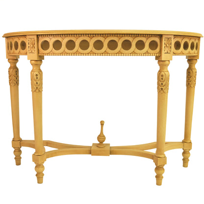 Decorative wooden table with intricate carvings on a white background