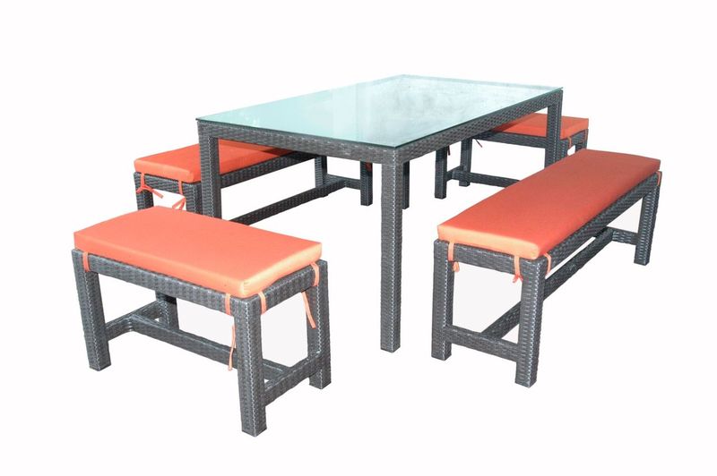 Outdoor furniture set with a table and benches on a white background